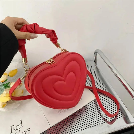 Lola – hartvormige gewatteerde crossbody tas van pu leer