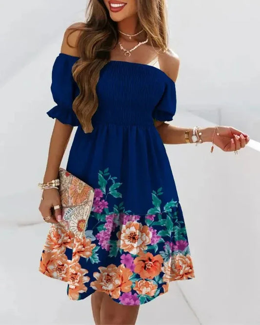 Matilda – Off-shoulder midi-jurk met bloemenprint en luchtige fit