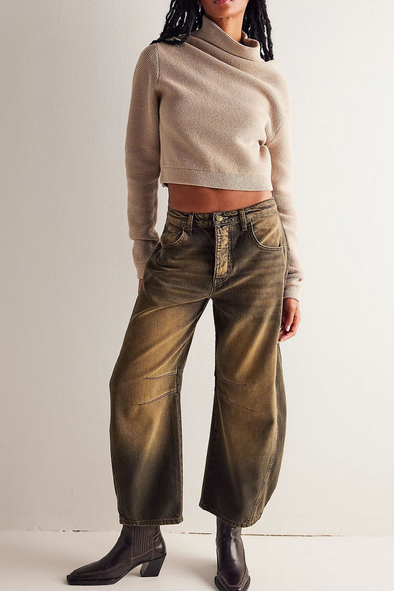Nina – low-rise jeans met flare pijpen en vintage wash
