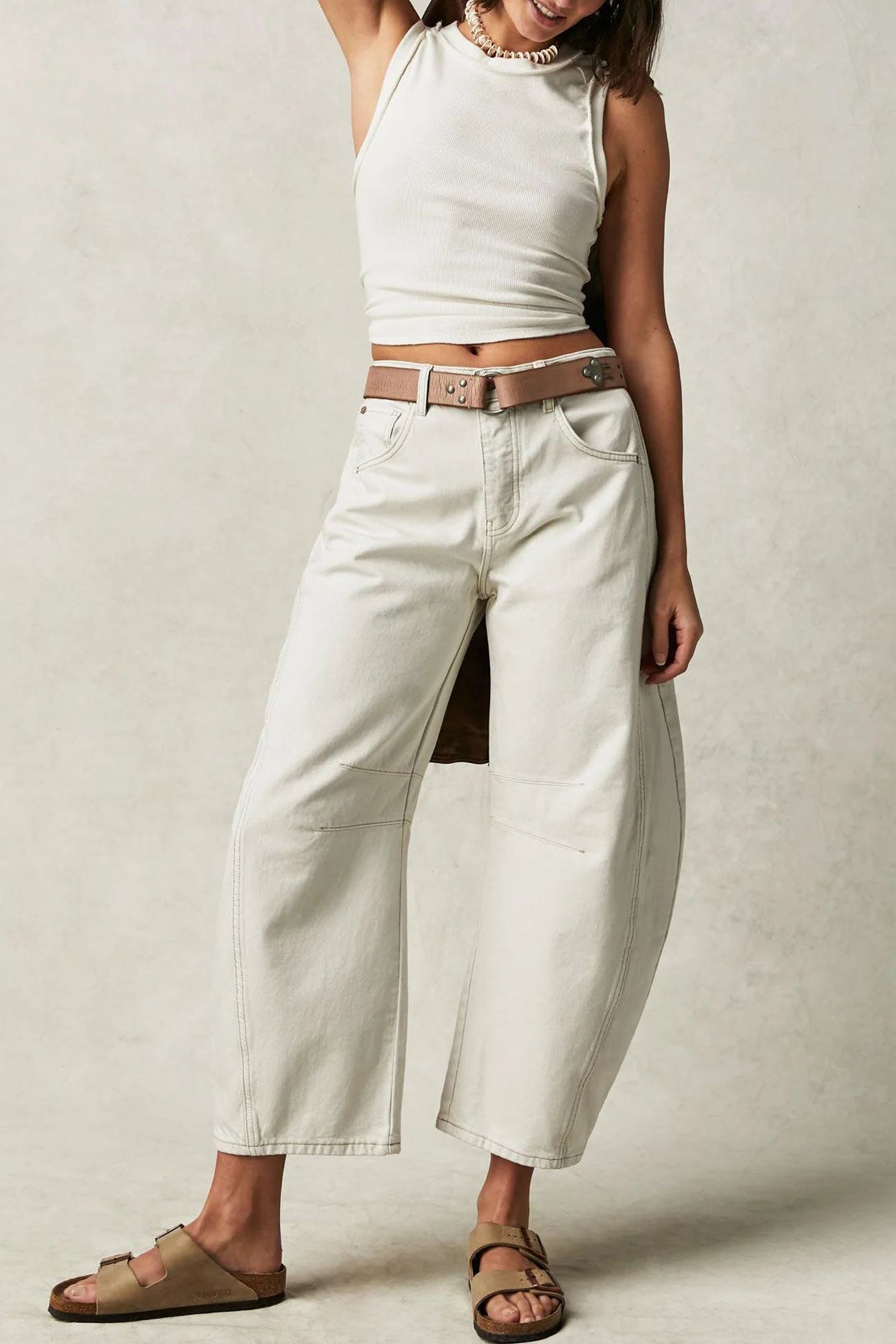 Nina – low-rise jeans met flare pijpen en vintage wash