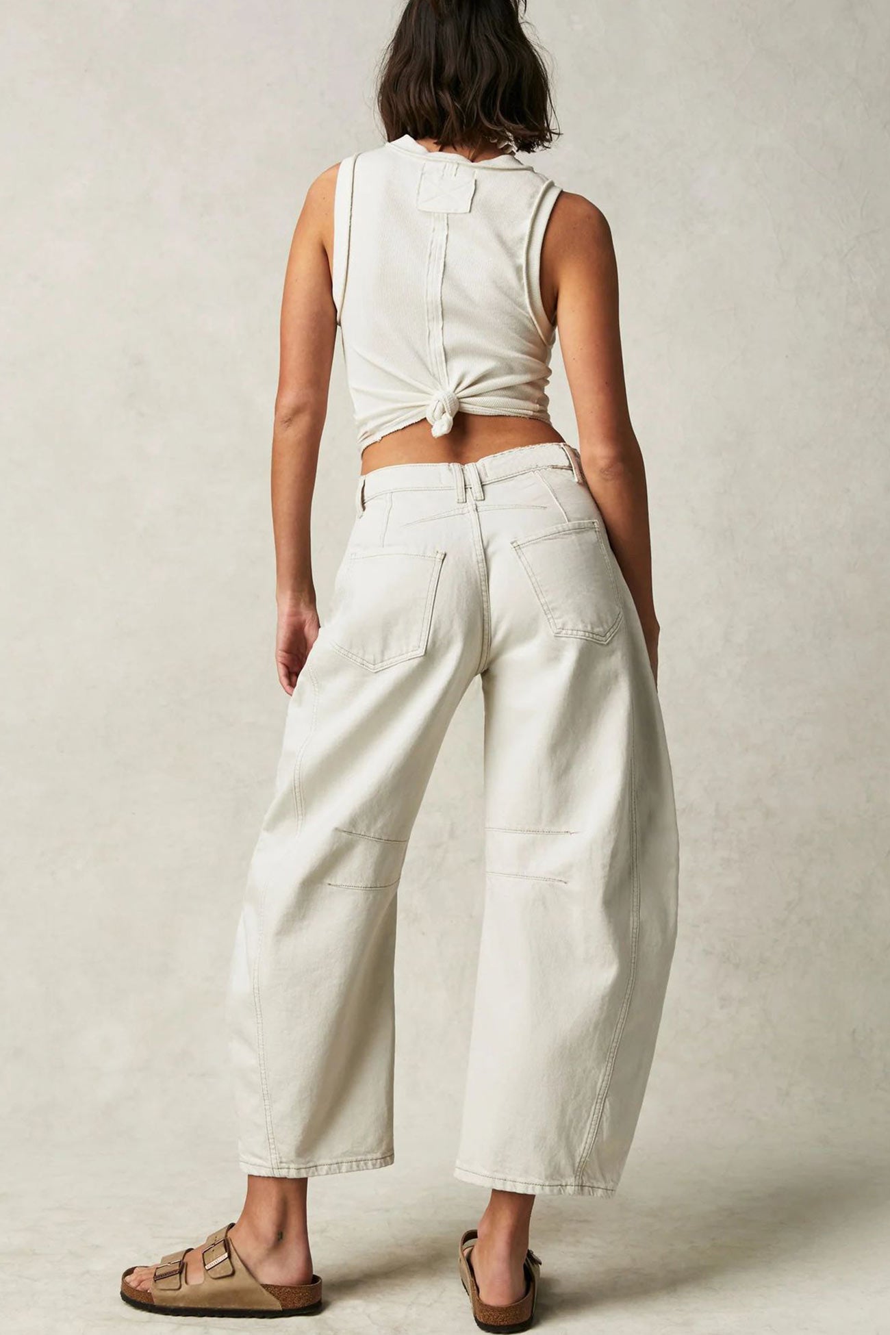 Nina – low-rise jeans met flare pijpen en vintage wash