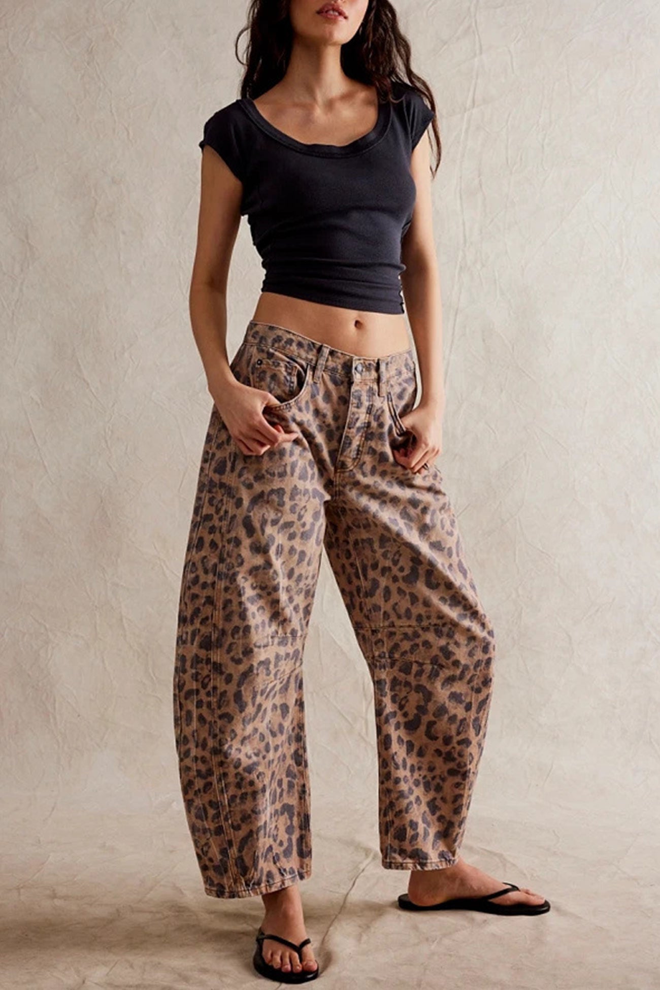 Nina – low-rise jeans met flare pijpen en vintage wash