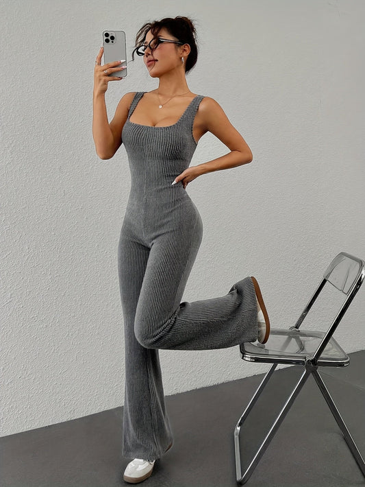 Nadia – Zwarte ribbel jumpsuit met vierkante hals en wijde pijpen