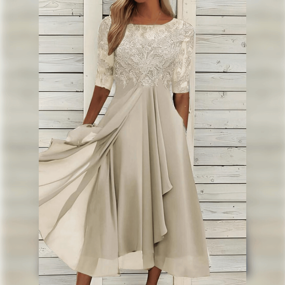 Lila – Zomerjurk van chiffon met kanten bovenlaag en halflange mouwen