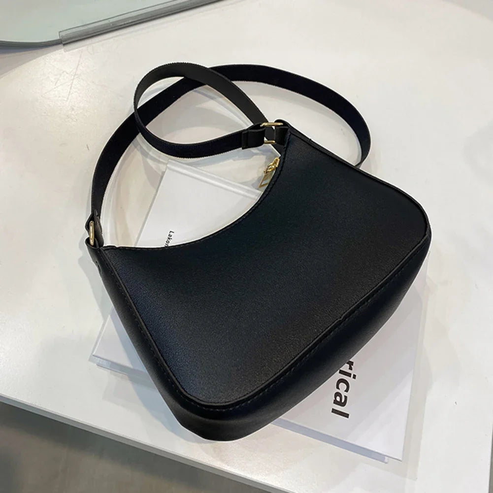 Romy – Zwarte Pu Schoudertas Met Retro Silhouet En Korte Riem