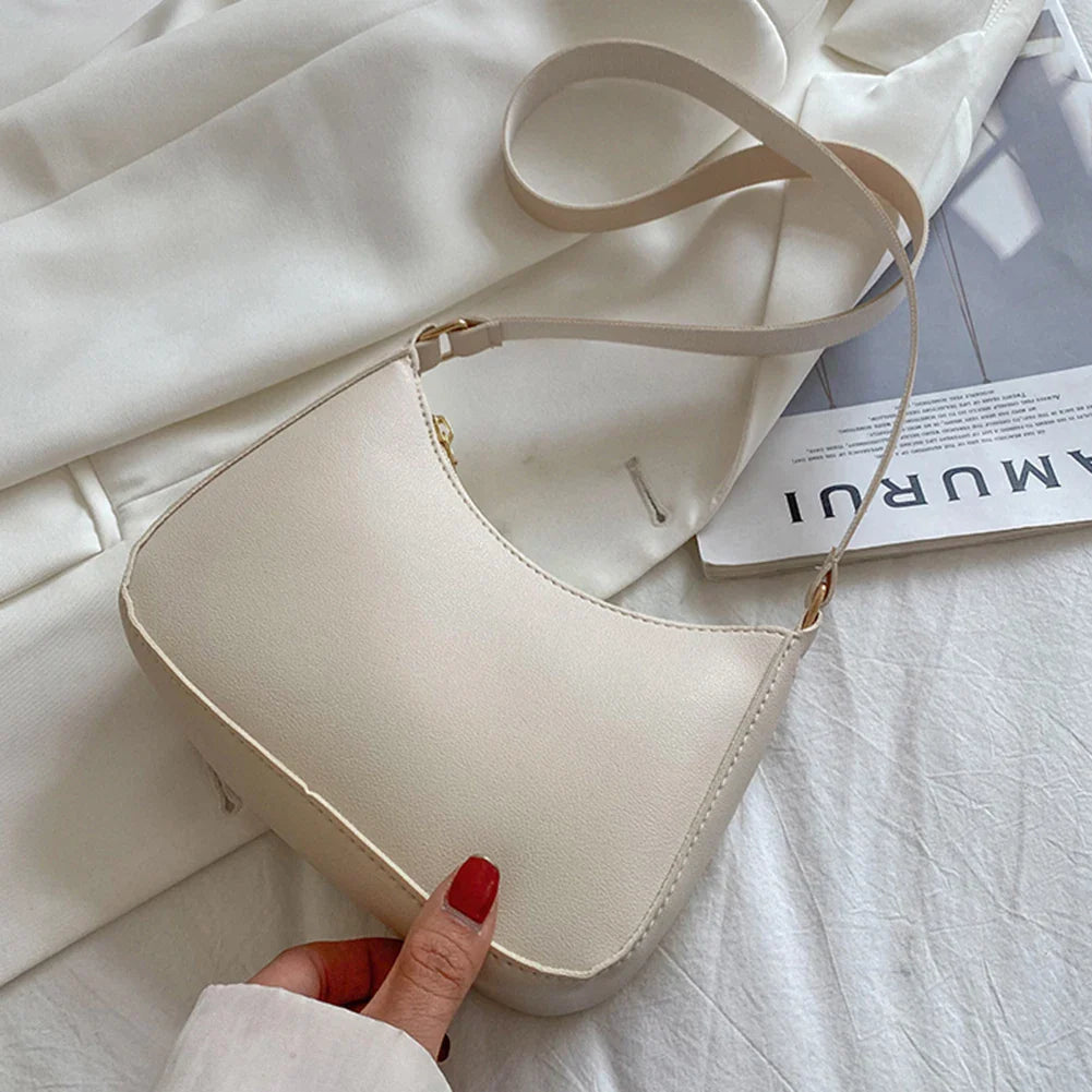 Romy – Zwarte Pu Schoudertas Met Retro Silhouet En Korte Riem