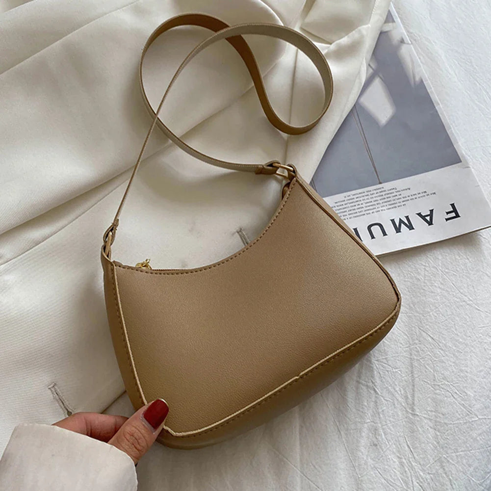 Romy – Zwarte Pu Schoudertas Met Retro Silhouet En Korte Riem