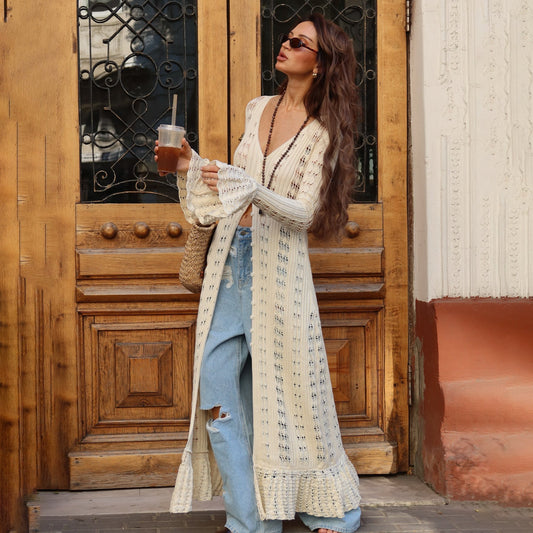 Isabel – lange oversized cardigan-vest met rufflezoom en uitlopende mouwen