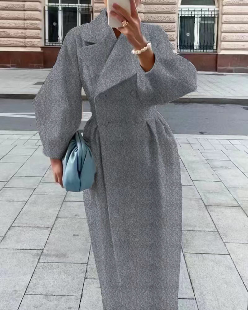 Natalia – lange trenchcoat met lantern mouwen en elegante kraag