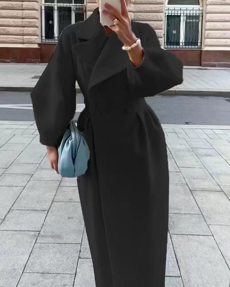 Natalia – lange trenchcoat met lantern mouwen en elegante kraag