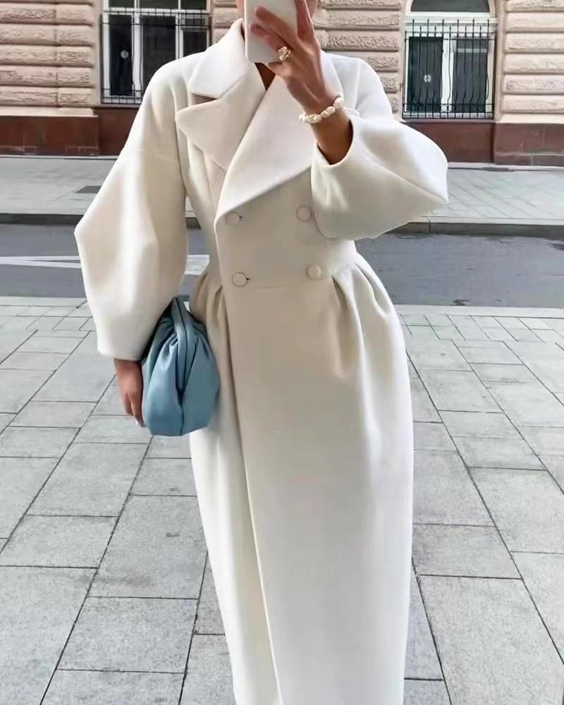 Natalia – lange trenchcoat met lantern mouwen en elegante kraag