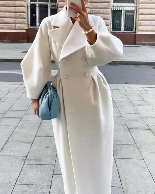 Natalia – lange trenchcoat met lantern mouwen en elegante kraag