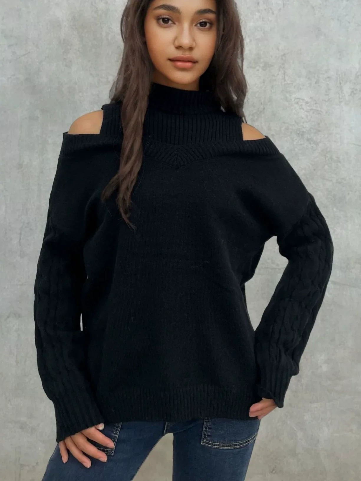 Livia – kabelgebreide off-shoulder trui met lantern mouwen