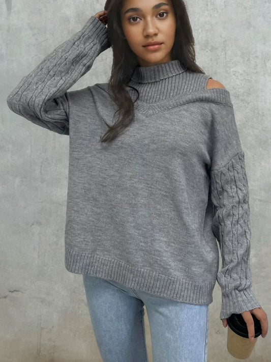 Livia – kabelgebreide off-shoulder trui met lantern mouwen