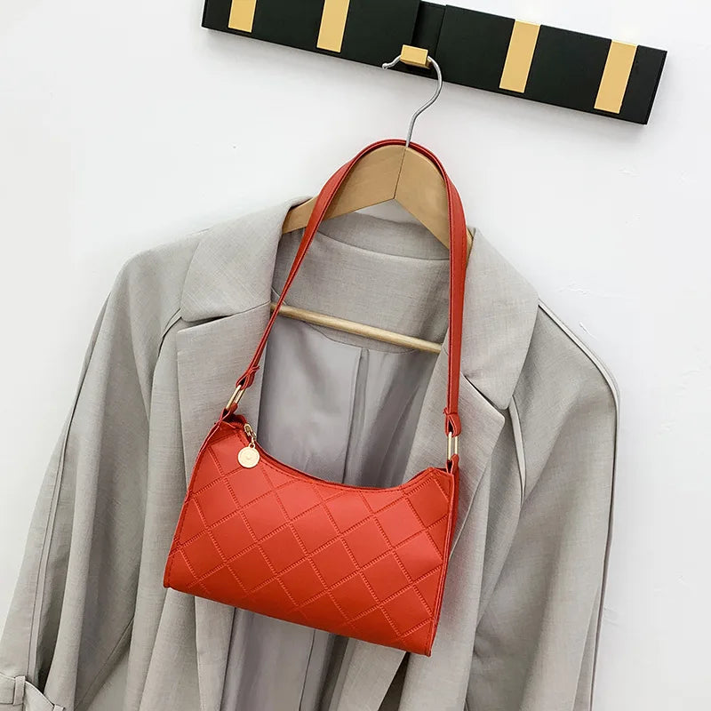 Naomi –  messenger schoudertas met verstelbare riem en klepsluiting