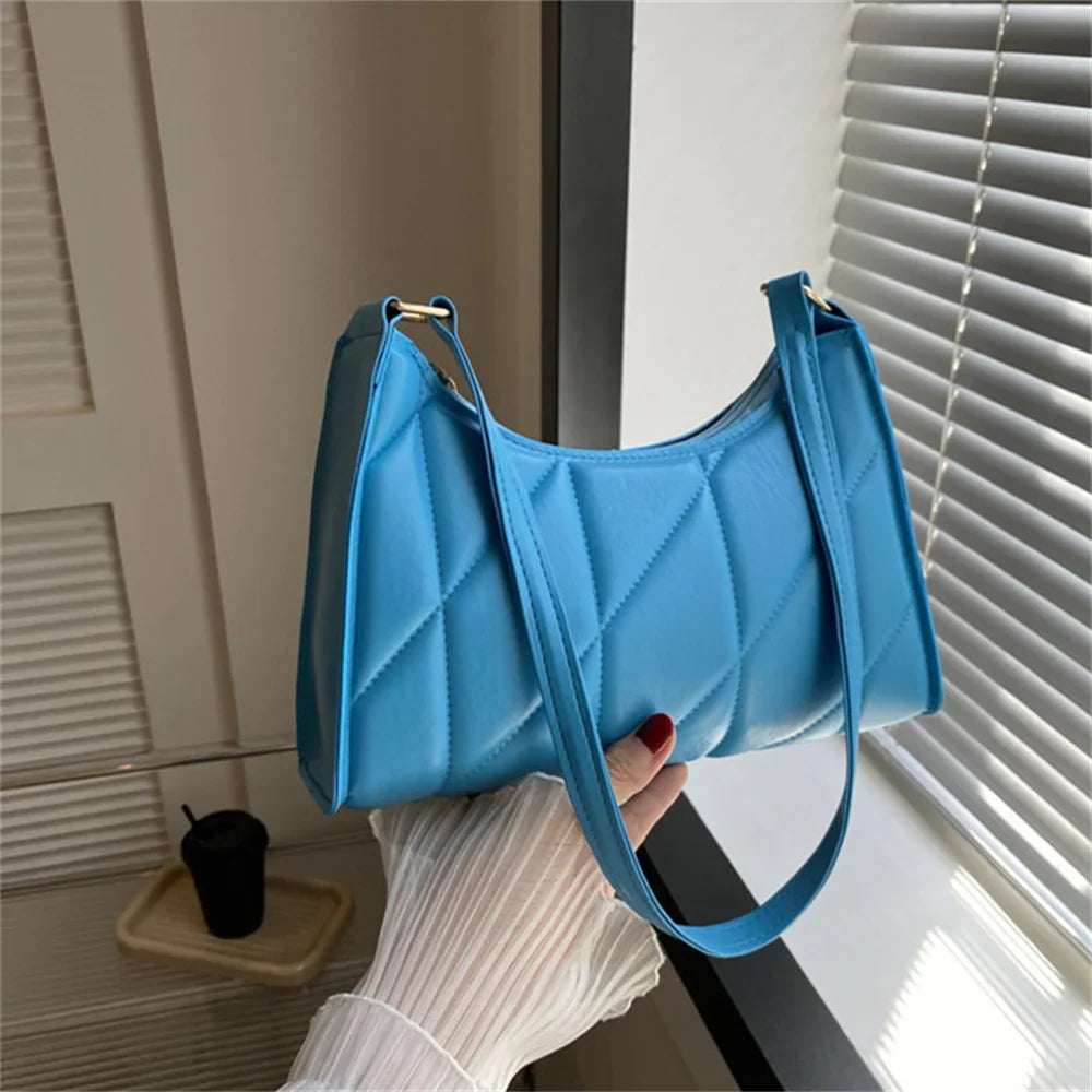 Naomi –  messenger schoudertas met verstelbare riem en klepsluiting