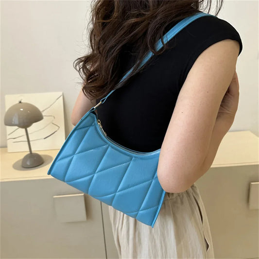 Naomi –  messenger schoudertas met verstelbare riem en klepsluiting