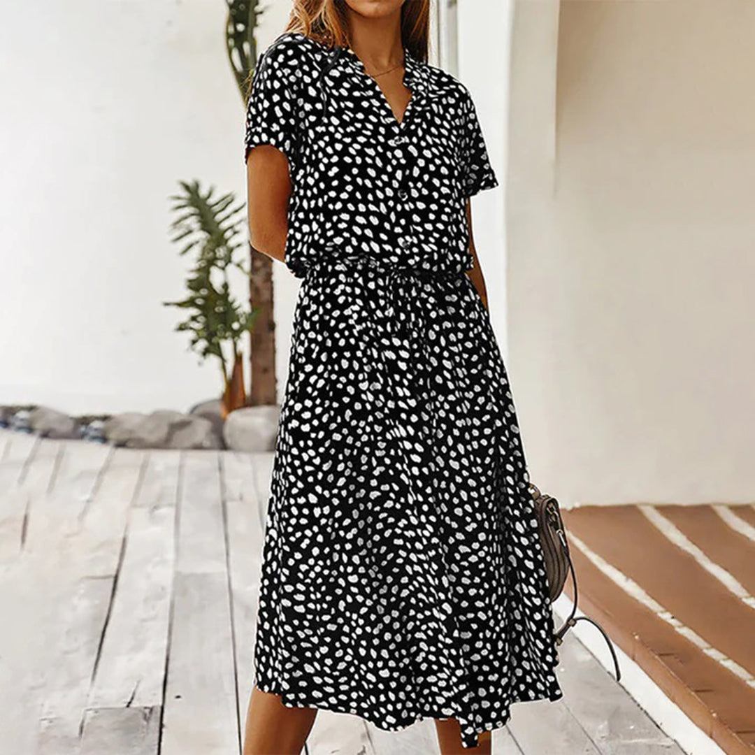 Nora – Luchtige Stippenprint Midi Zomerjurk