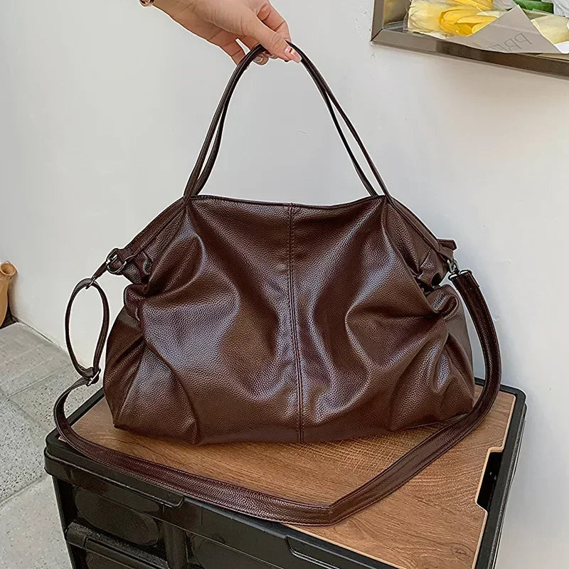 Elin – ruime retro schoudertas van pu-leer met crossbodyband
