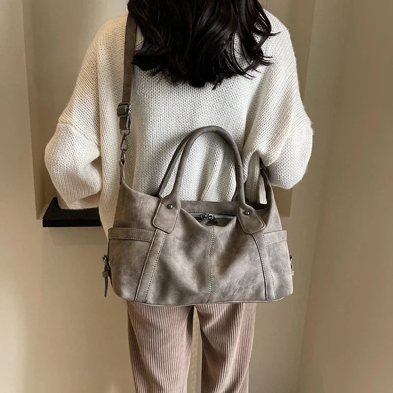 Elin – ruime retro schoudertas van pu-leer met crossbodyband