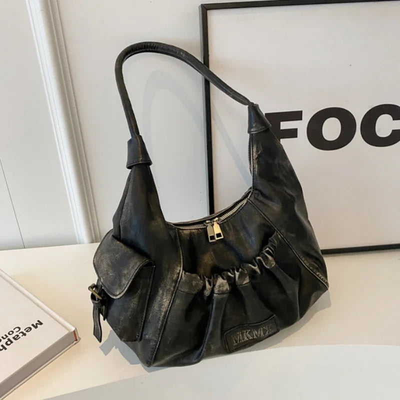 Fay – compacte underarm schoudertas van glad kunstleer met retro vormen
