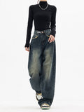 Donkerblauwe wide leg jeans met vintage wassing