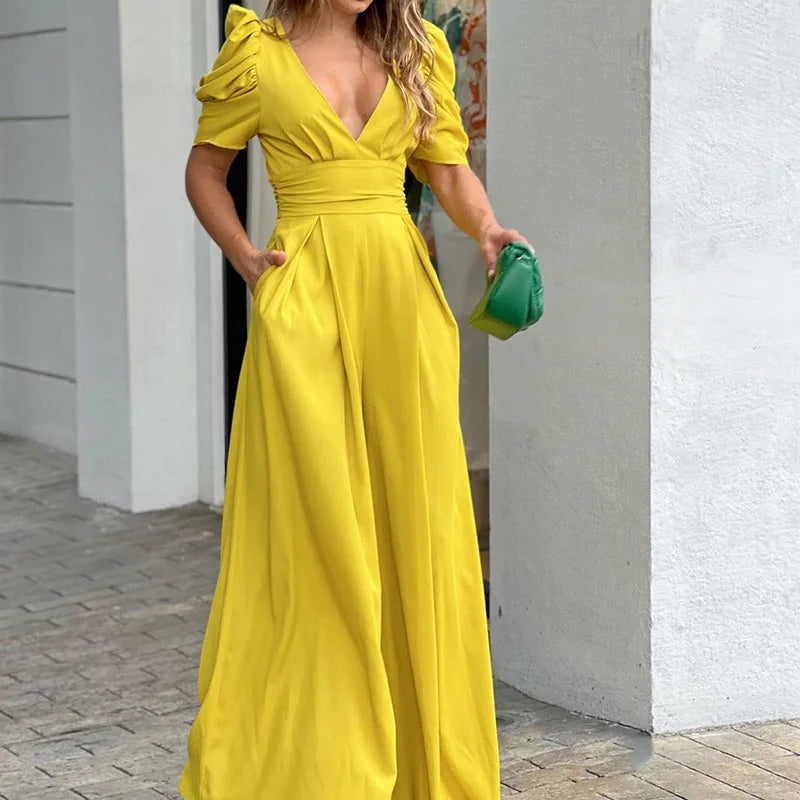 Noa – V-hals Jumpsuit met  pofmouwen en wijde pijpen