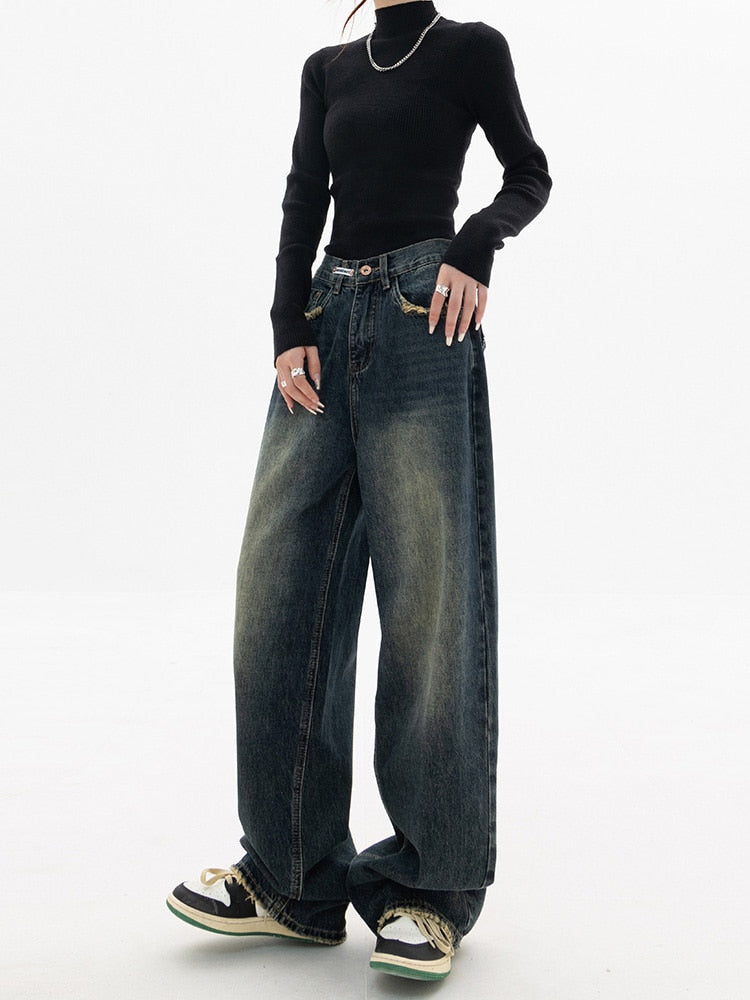 Donkerblauwe wide leg jeans met vintage wassing