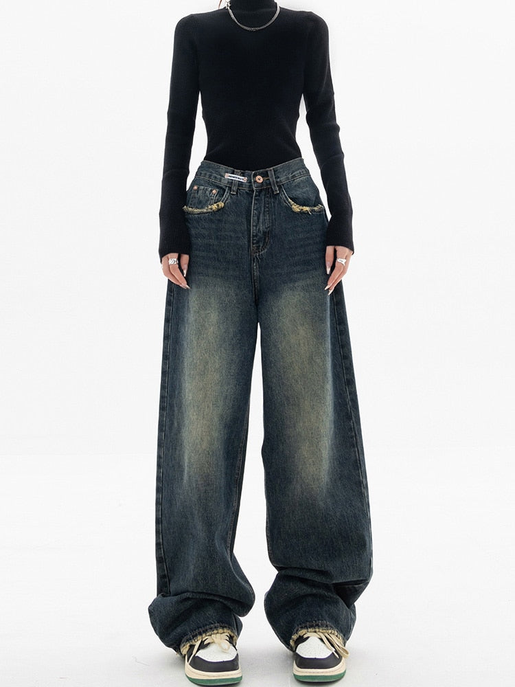 Donkerblauwe wide leg jeans met vintage wassing
