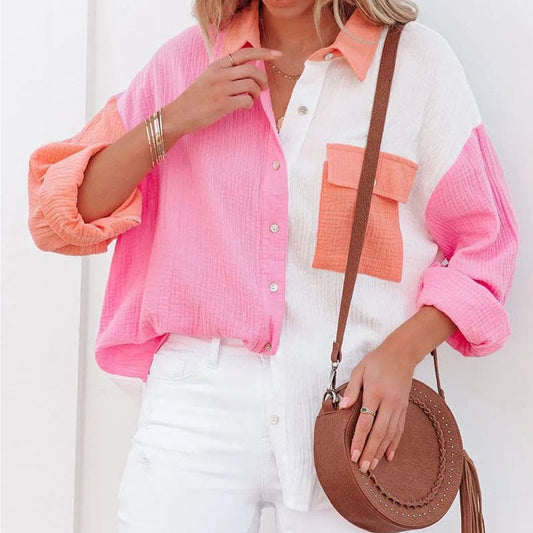 Shirley – V-hals blouse met knoopsluiting en opgerolde mouwen
