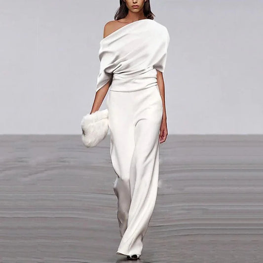 Vera – Getailleerde jumpsuit met single-breasted halslijn en elegante wijde pijpen