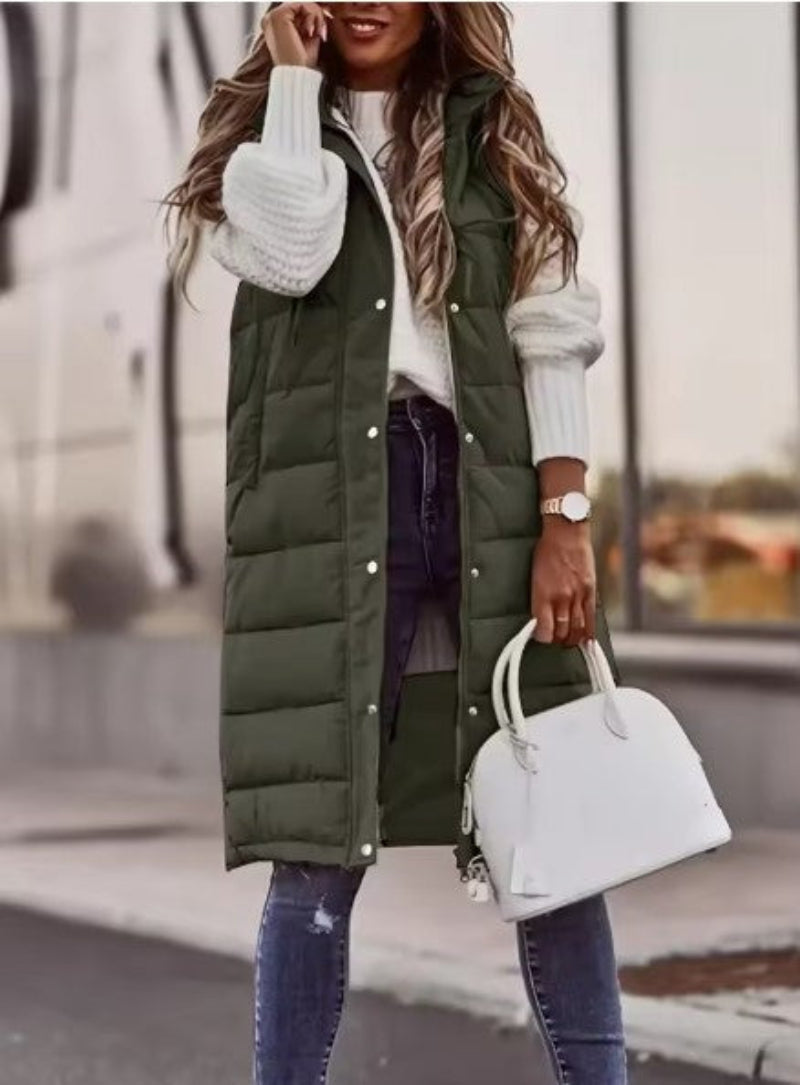 Camille – dames lange bodywarmer met capuchon en steppatroon