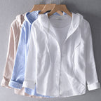 blouse met capuchon en knoopsluiting