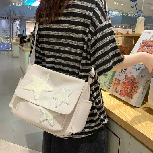 Nina – ruime crossbody tote tas met sterrenprint