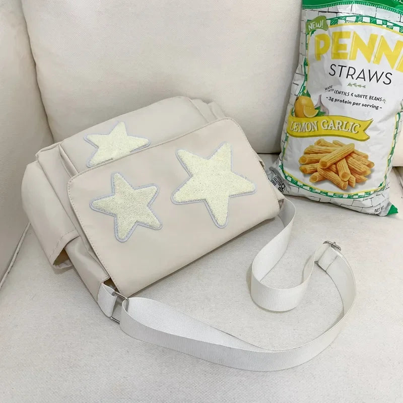 Nina – ruime crossbody tote tas met sterrenprint