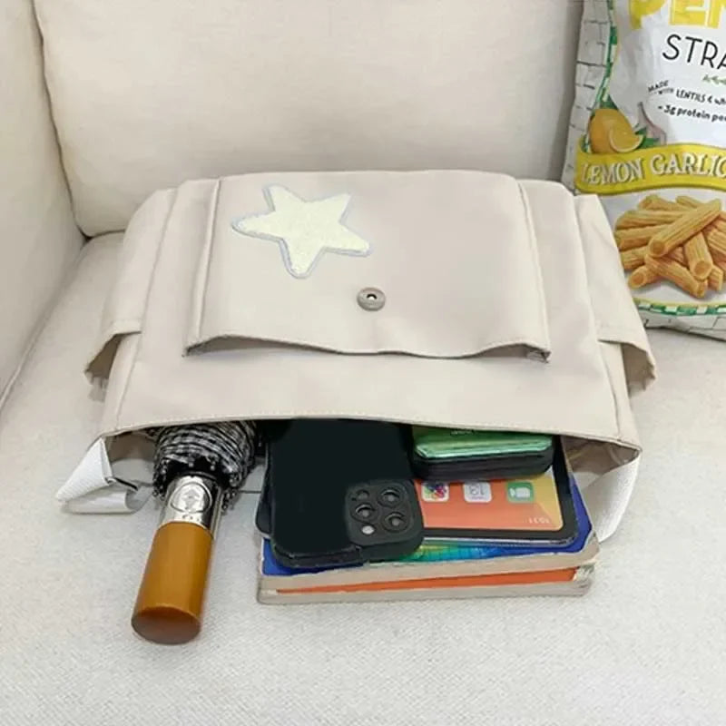 Nina – ruime crossbody tote tas met sterrenprint