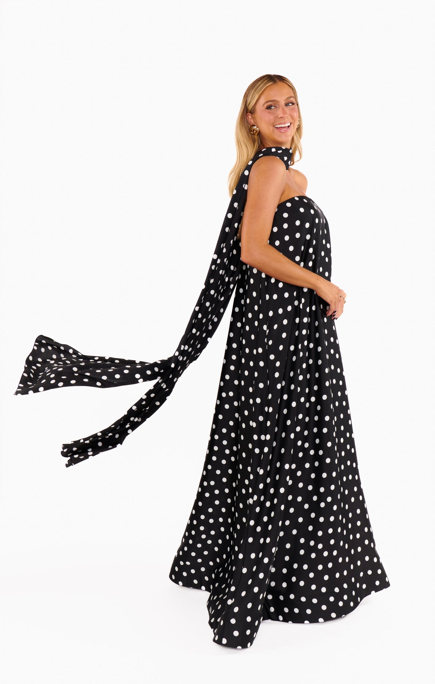 Ava – Zwarte tubejurk met witte polka dots