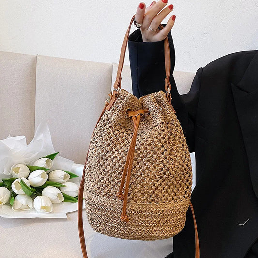 Lina – gevlochten straw crossbody handtas met lange band