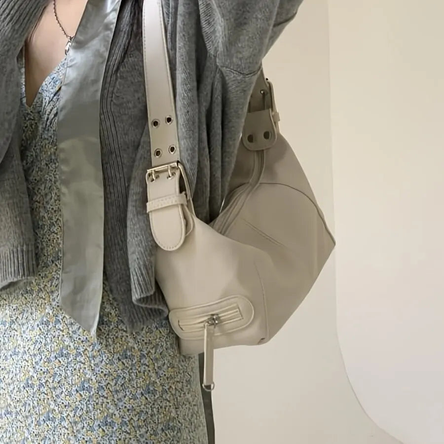 Roxy – schoudertas met metalen accenten en grove rits
