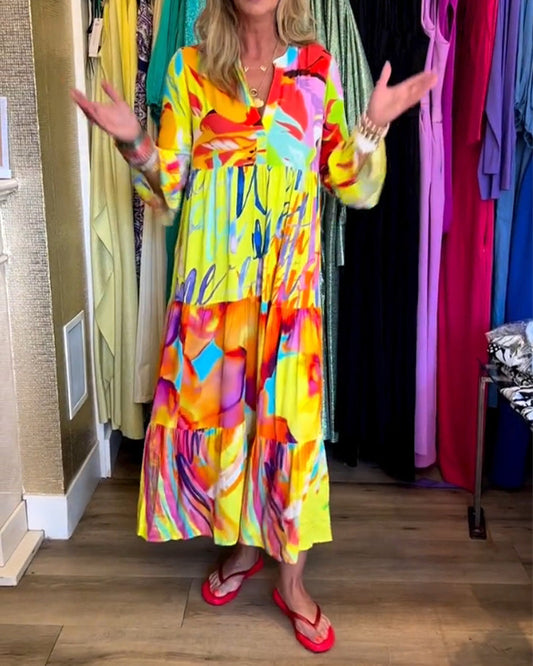 Lotte – Gele jurk met uitlopende mouwen elastische taille en speelse print