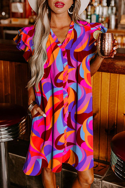 Liv – Shift jurk met zomers patroon en elegante ruffle mouwen