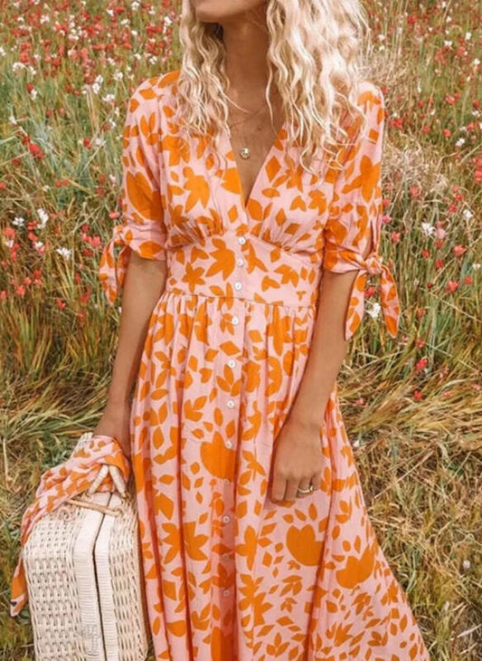 Lena – V-hals Zomerjurk met bloemenprint en strikmouwen
