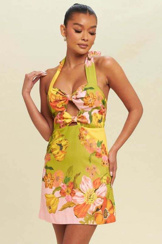Isla – Zomerse A-lijn halter jurk met open rug en knoopdetail