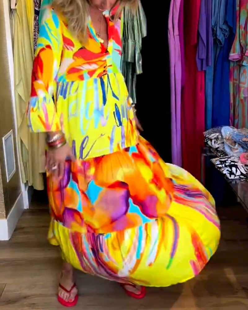 Lotte – Gele jurk met uitlopende mouwen elastische taille en speelse print