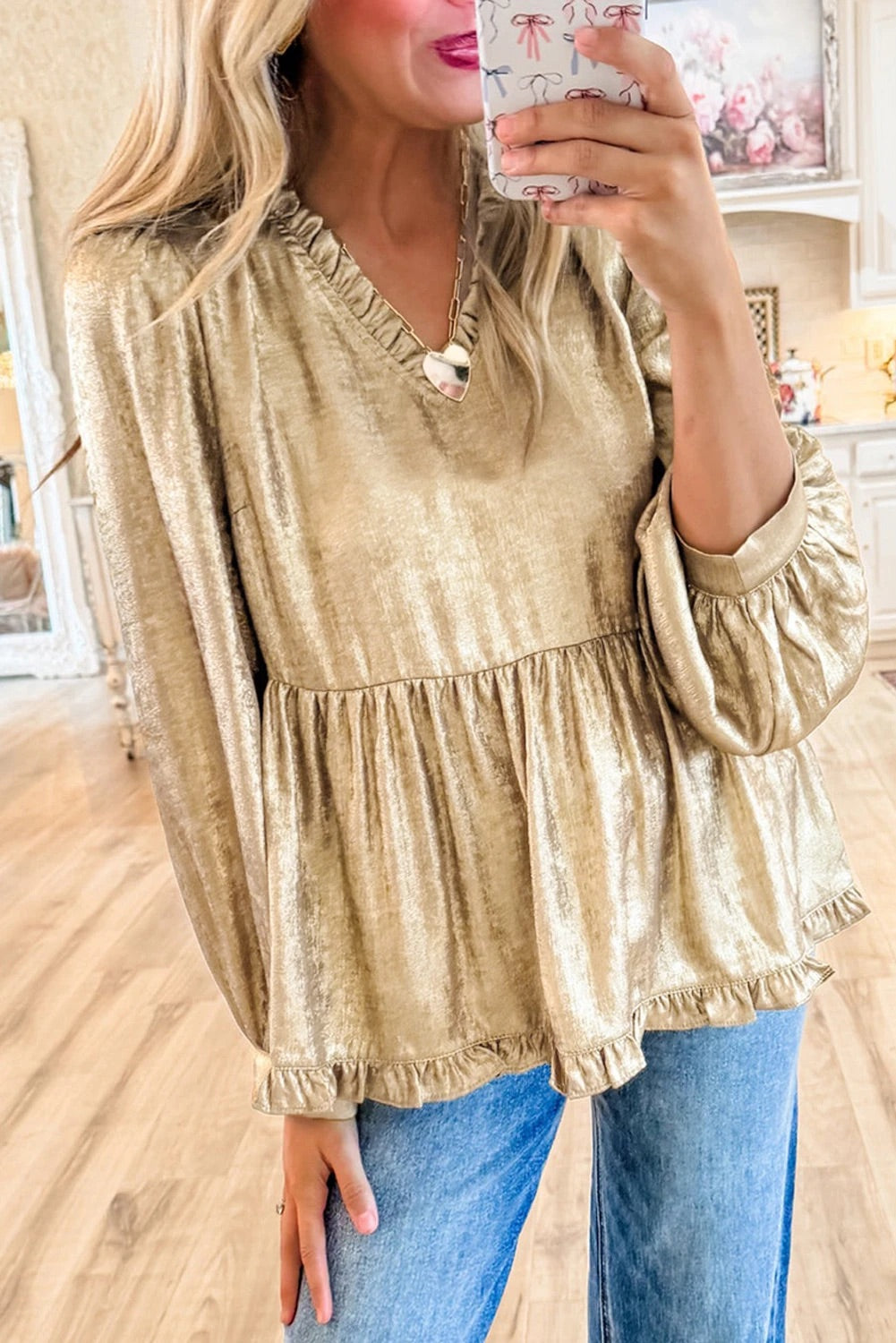 Glanzende blouse met V-hals en peplum model