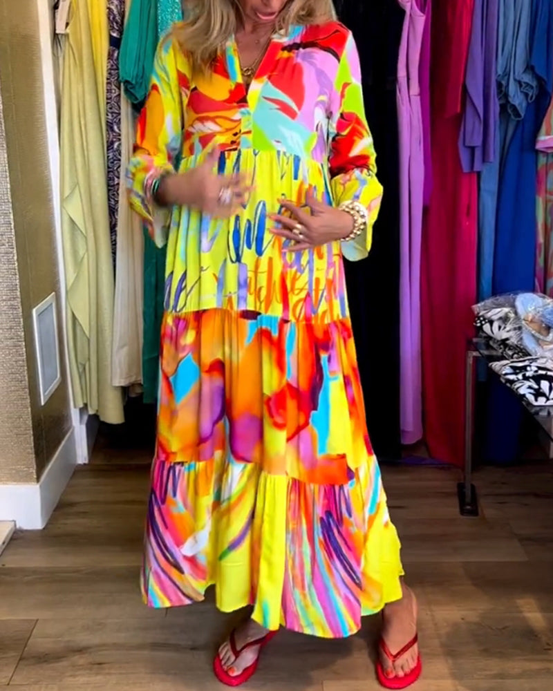 Lotte – Gele jurk met uitlopende mouwen elastische taille en speelse print