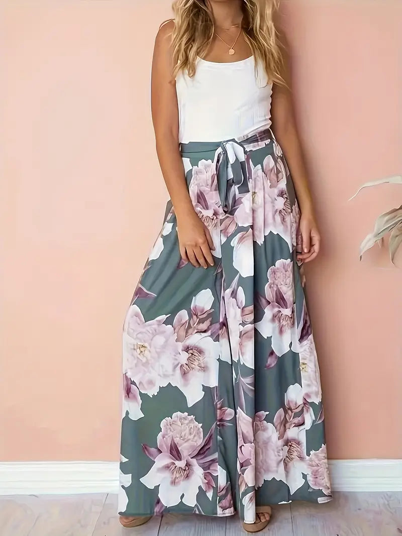 Aisling – Bloemenprint, hoge taille, wijde palazzo-broek met strikceintuur