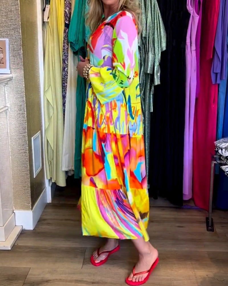 Lotte – Gele jurk met uitlopende mouwen elastische taille en speelse print