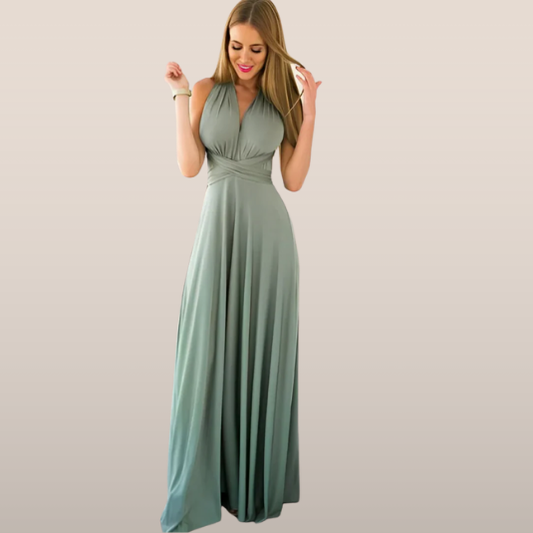 Soraya – Maxi-jurk met gekruiste halterrug soepele stof en strikdetail in de taille