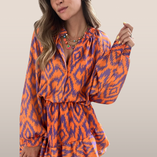 Isla – Multicolor jurk met grafische print en ballonmouwen